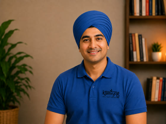 Arjun Acharya, the sales and service lead mentor, in a blue turban and KarmYog polo
