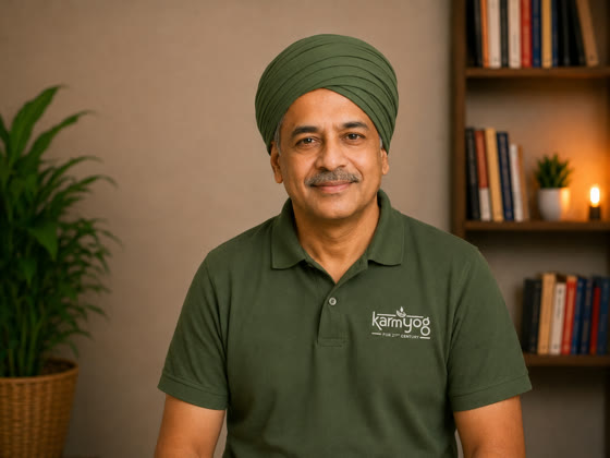 Neeranjan Acharya, the AI farming and aquaculture mentor, in a green turban and KarmYog polo